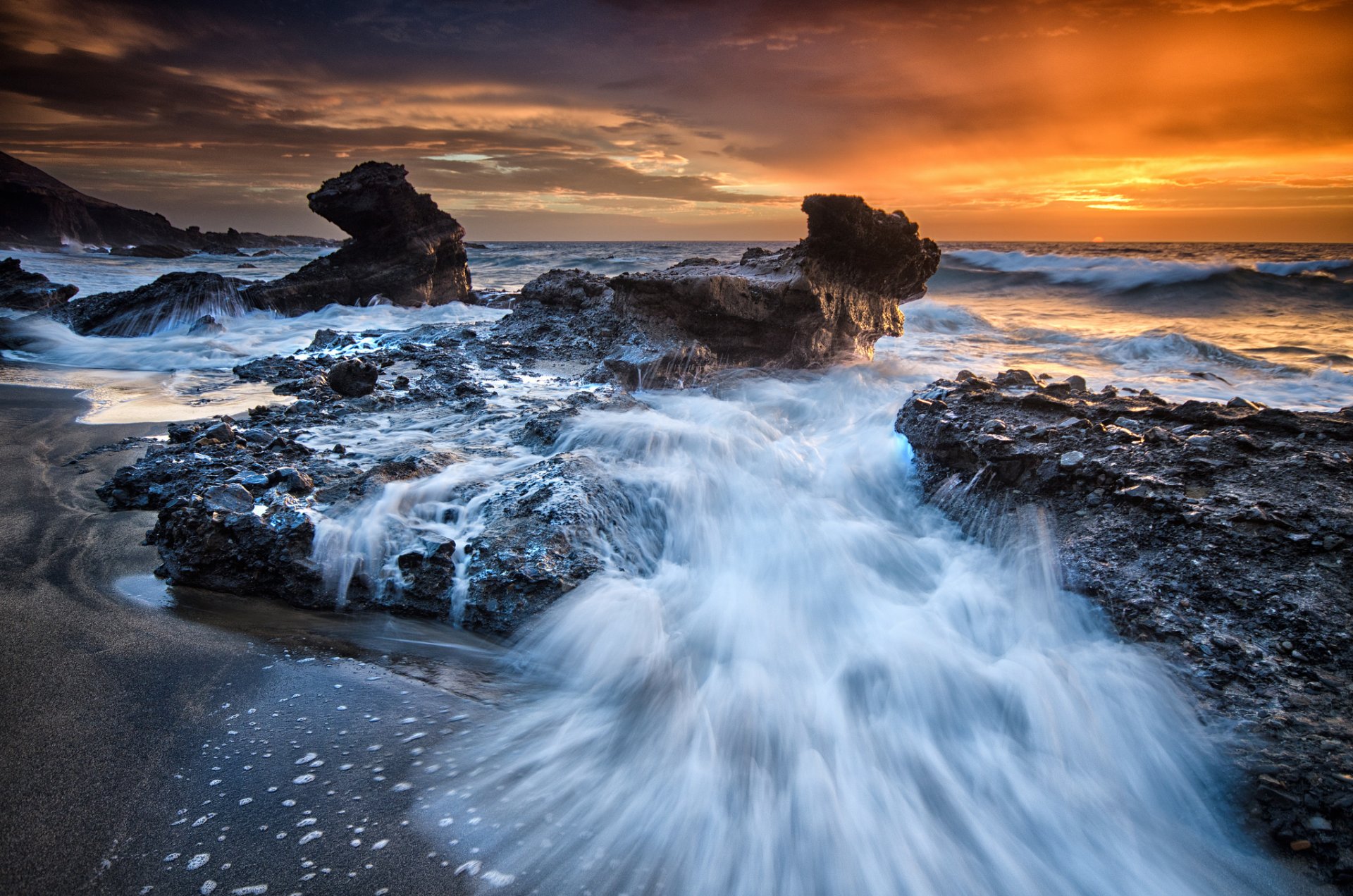 spanien atlantik kanarische inseln strand felsen sonnenuntergang