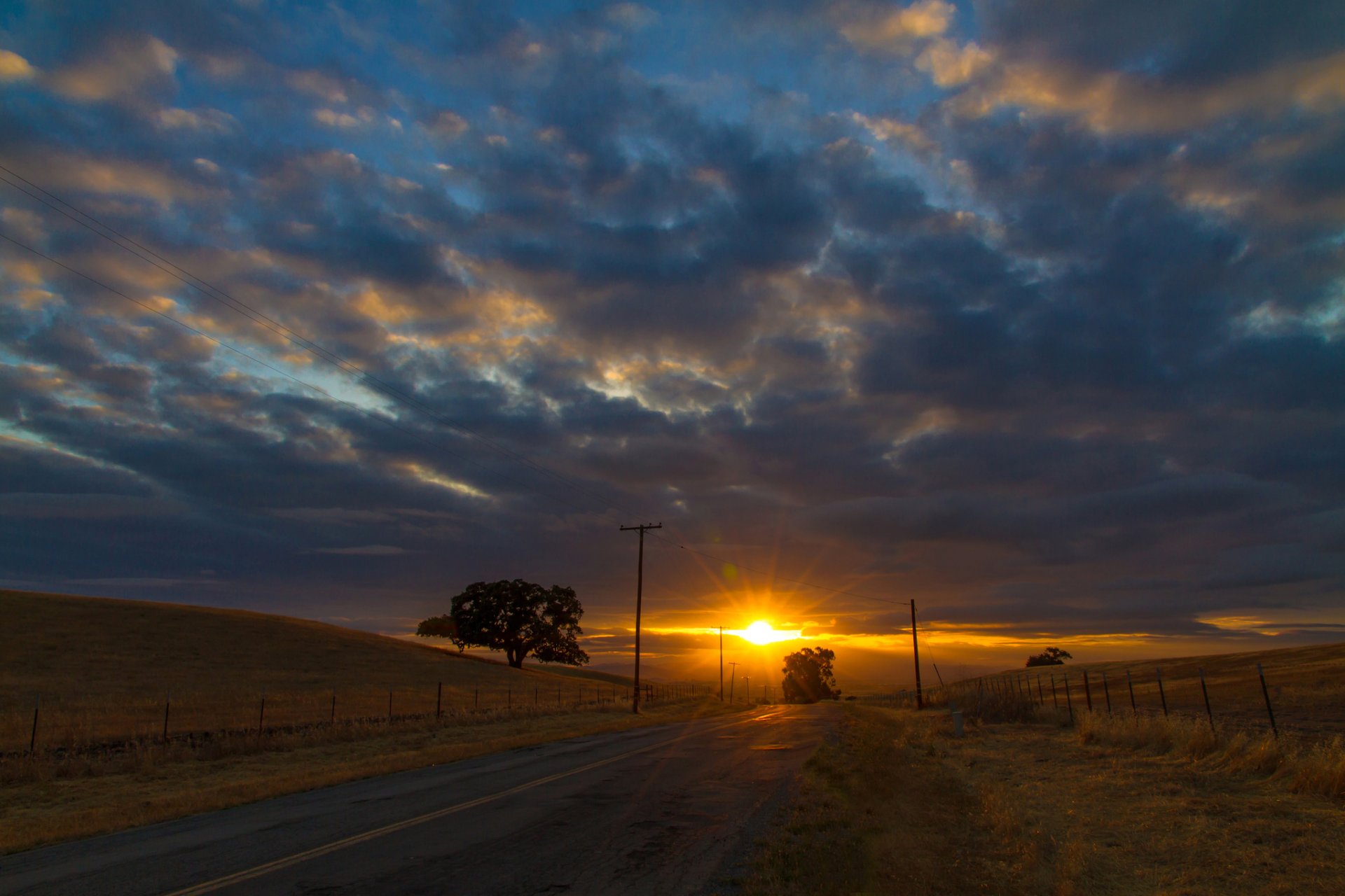 ky clouds sunset hills road sun rays tree autumn