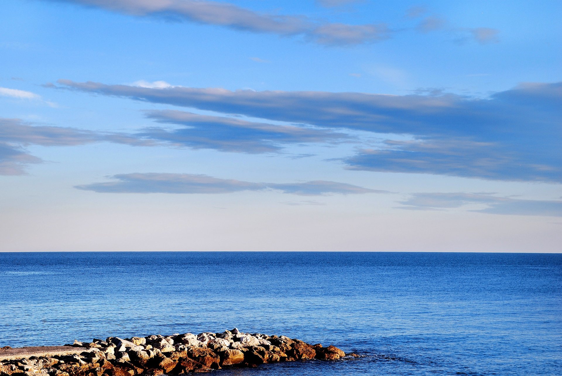 meer küste sense steine horizont himmel