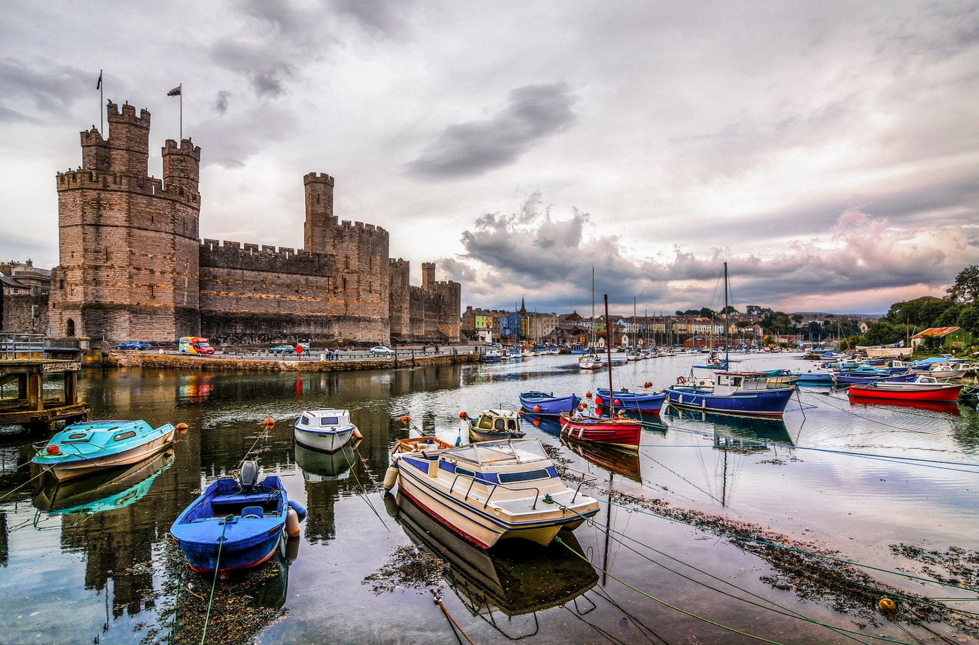 caernarfon castle harbor wales united kingdom the port castle fortress tower boat sky cloud