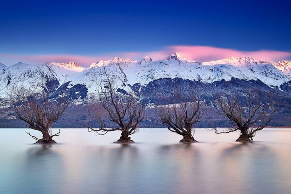 Lake on the background of the southern Alps