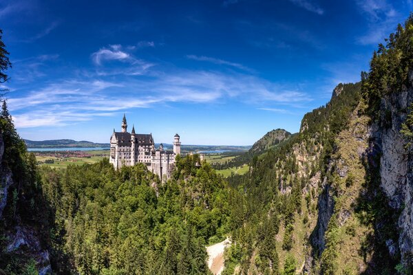 Castle near mountains and trees