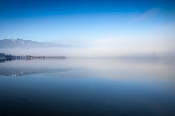 Fog on the lake at dawn