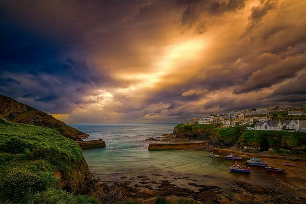 English village and ships at sea