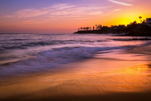 The shore of sandy yarn at sunset