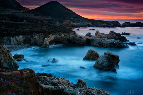 Dawn on the rocky seashore