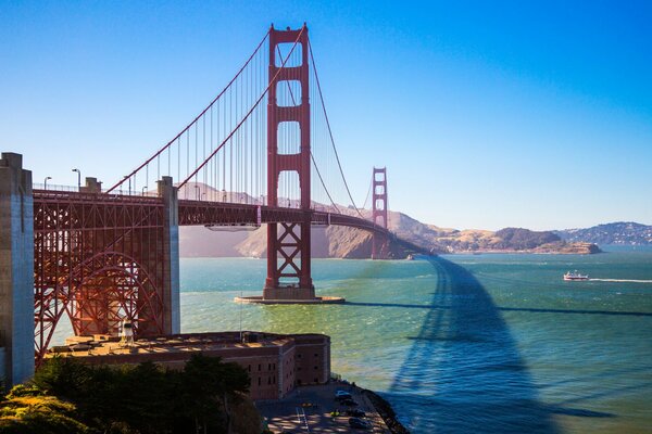 Bridge across the bay straight into the mountains