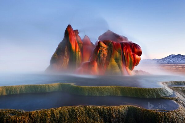 Futuristic view of a geyser against the sky