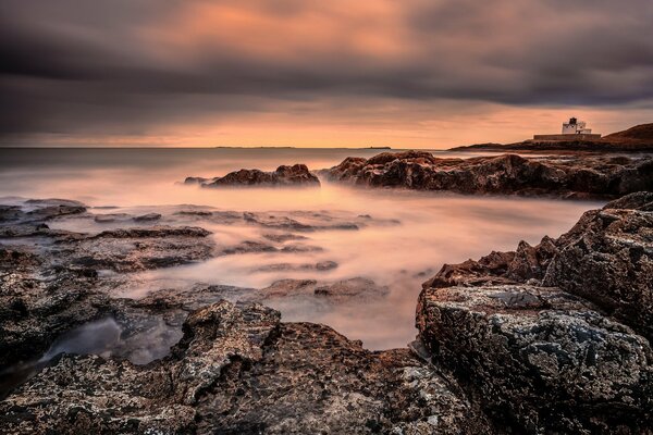 Sunset at the cliffs of the seashore