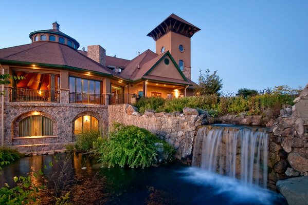 Villa with artificial waterfall and pond