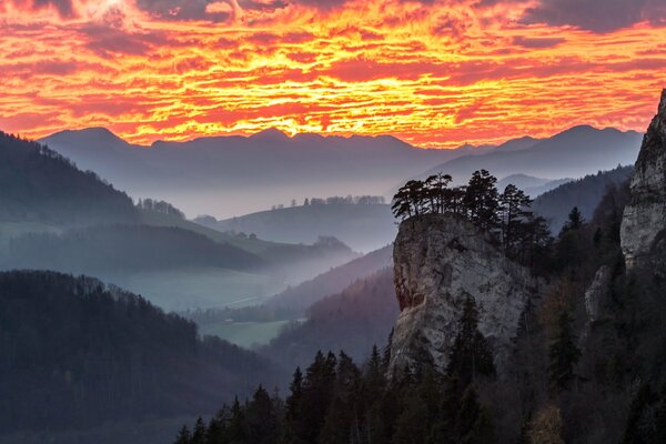 Red hakat with mountains in the fog