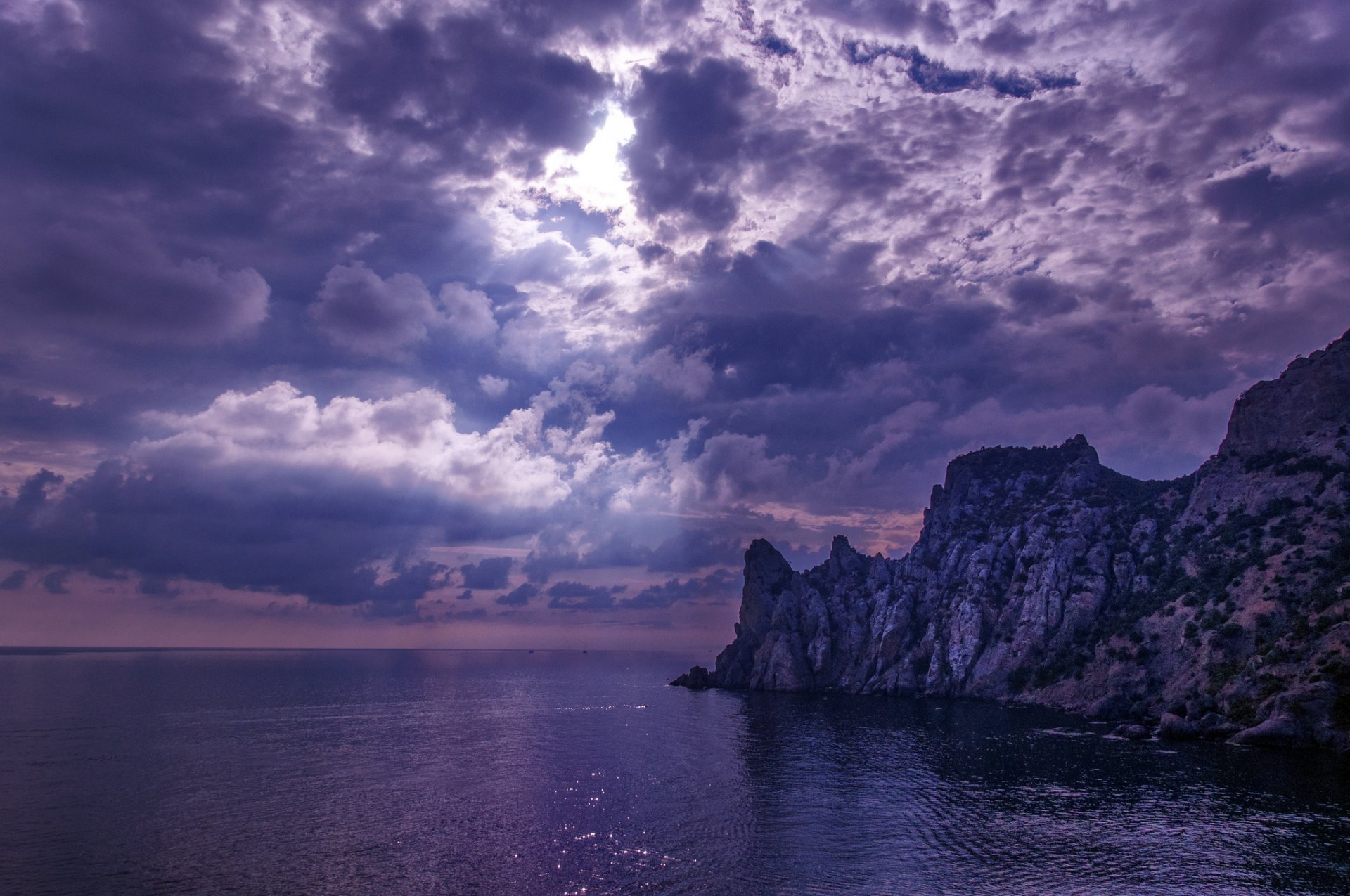 ea beach rock clouds sun ray