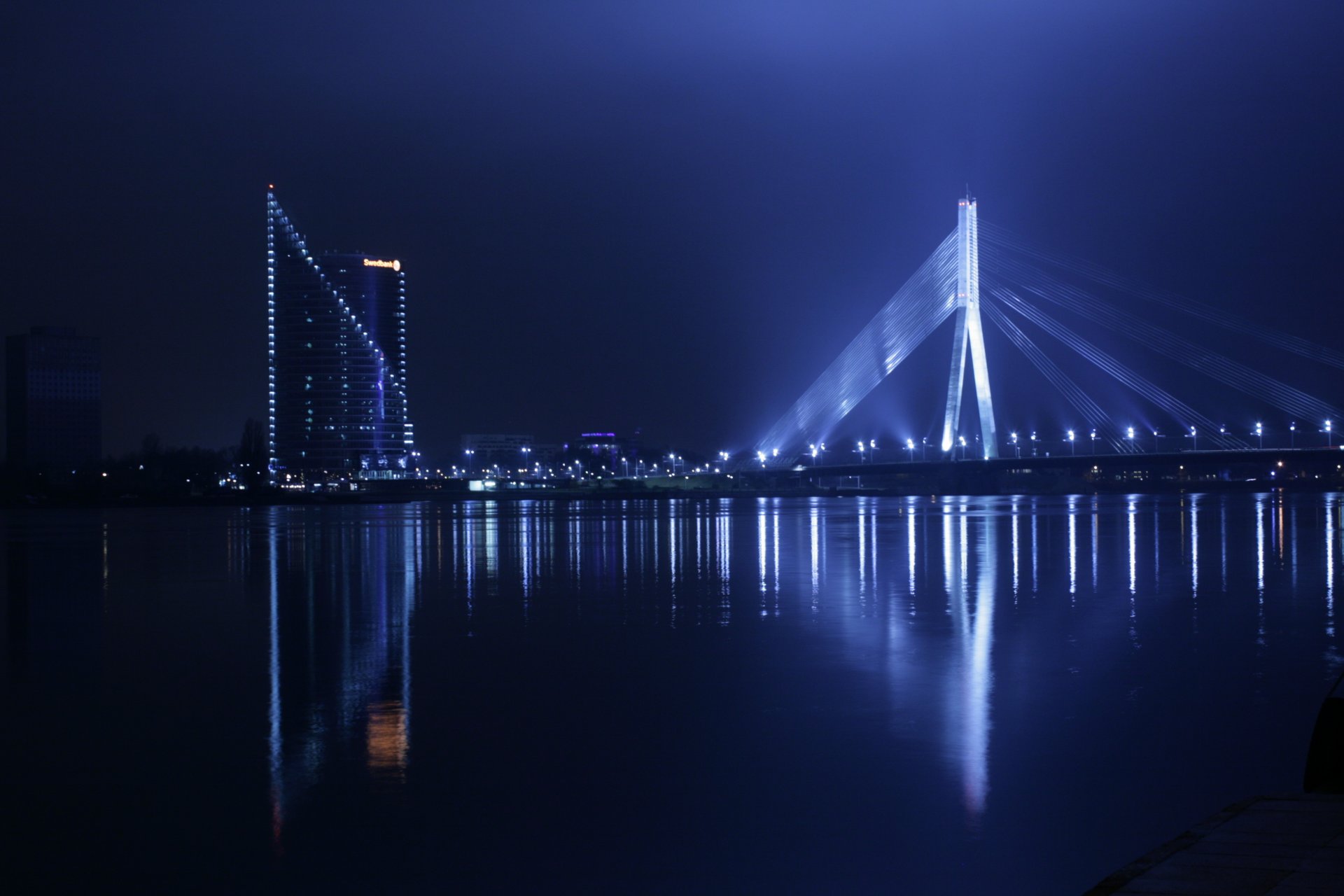 riga brücke nacht staro rīga lichter wasser