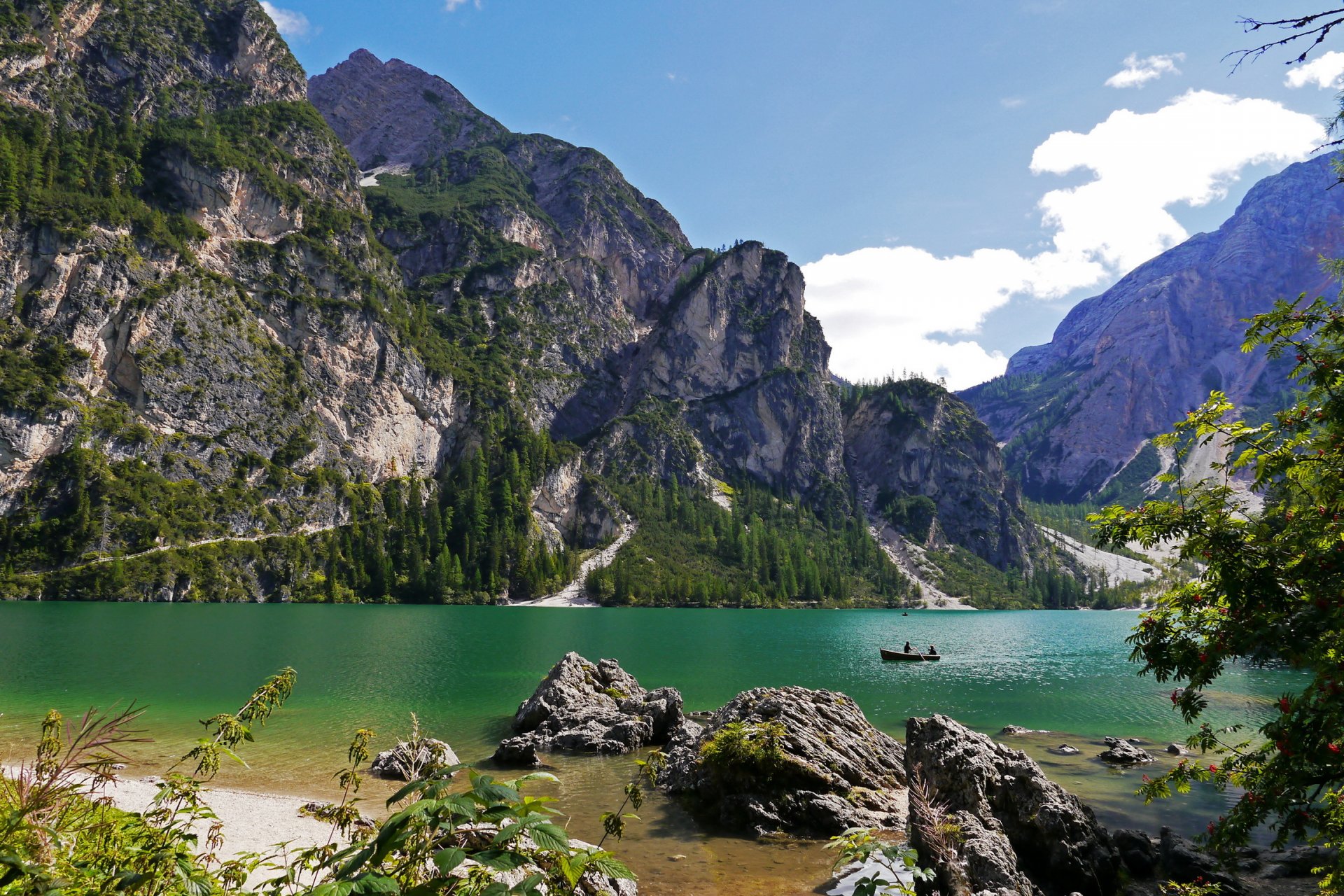 italy scenery braies nature mountain rock tree lake boat landscape