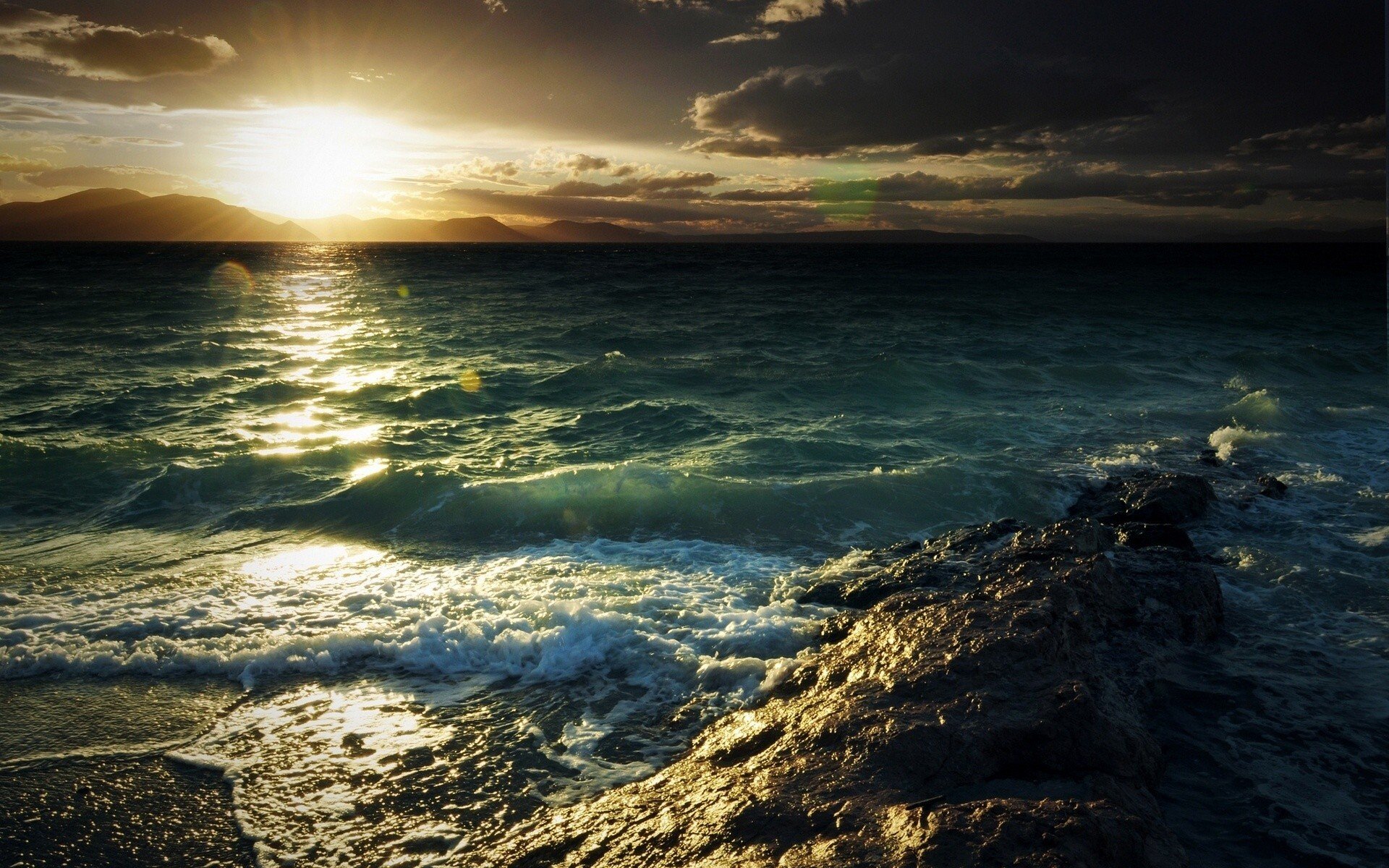 mare acqua nuvole cielo riva