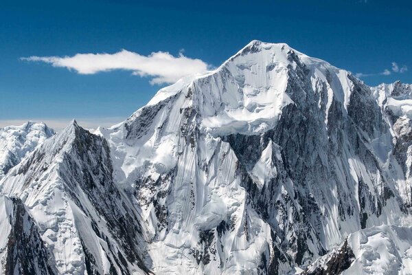 Snowy mountain in the clouds