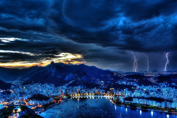 Photo of Rio de Janeiro at night. Sparkling lightning