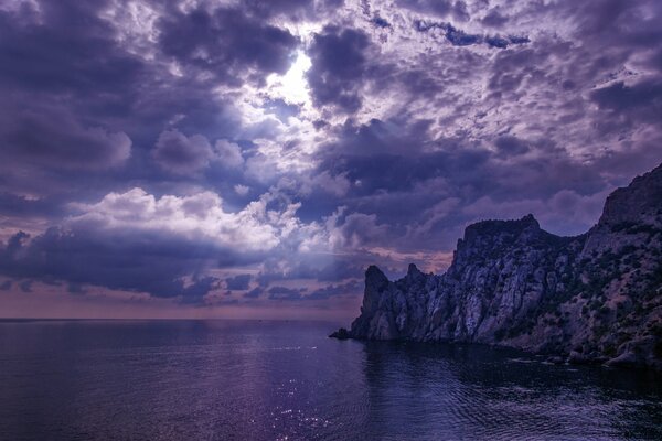 Mysterious beach with a high cliff