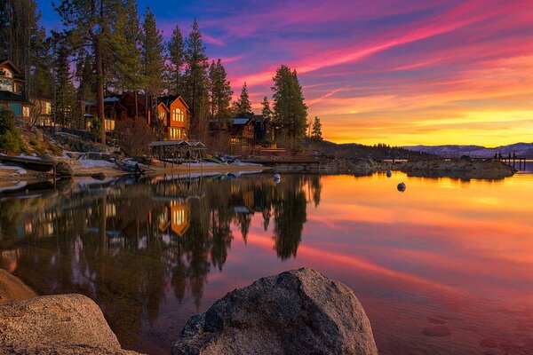 A bright sunset by the water in California