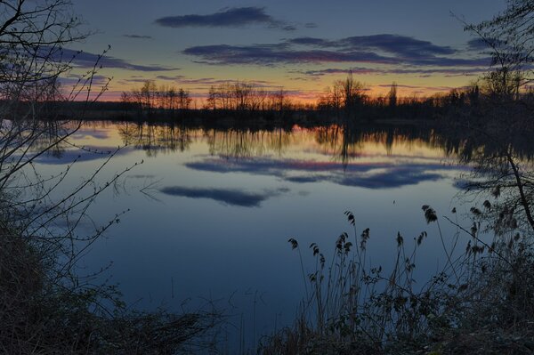 Sunset on the river bank