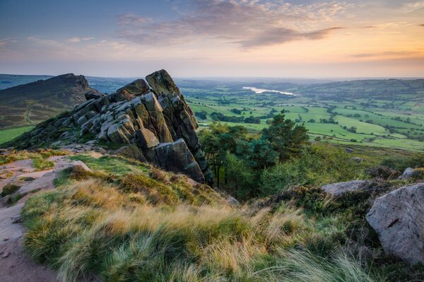 Rocks among the grass morning dawn