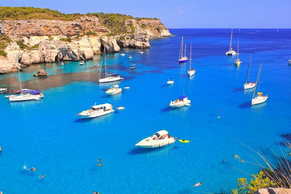 White yachts at sea