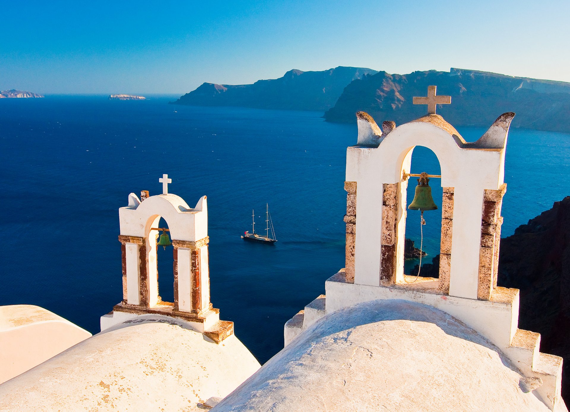 oia santorini greece aegean sea yacht bell island