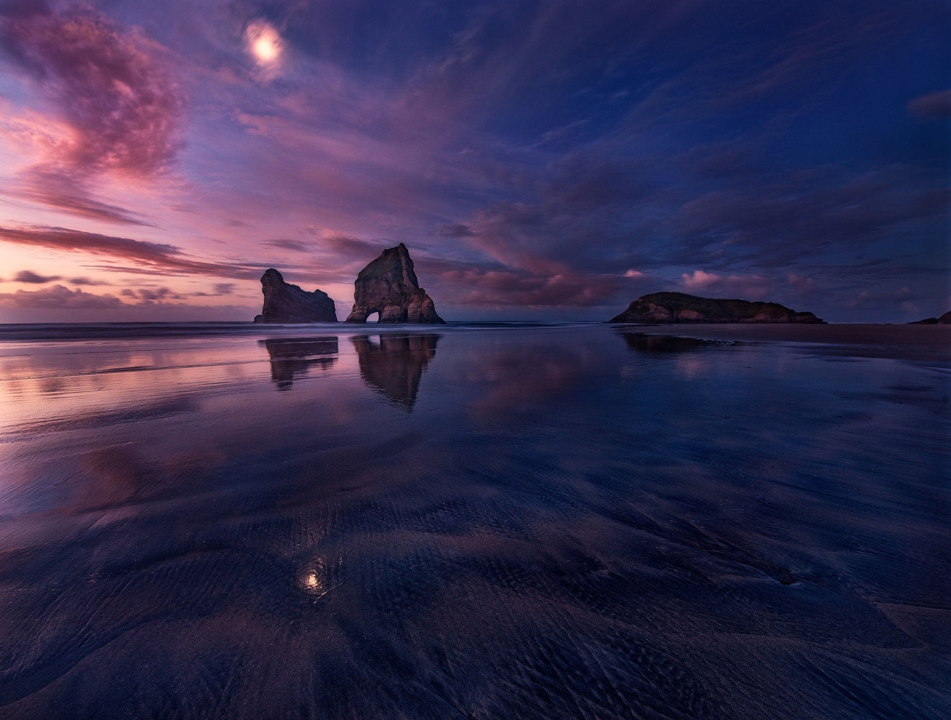 beach rock reflection sky