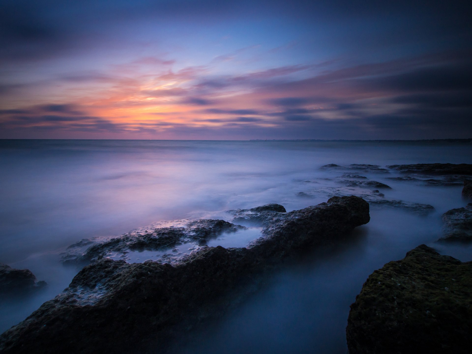 atlantic spain beach stones sea calm night sunset blue sky cloud