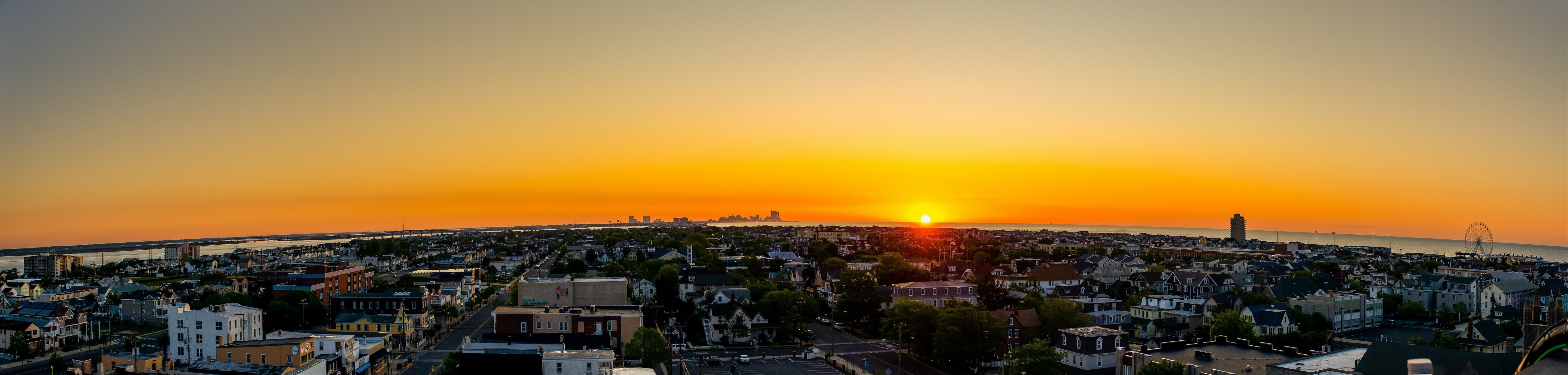 stadt abend sonnenuntergang himmel wolken sonne meer wasser zuhause gebäude