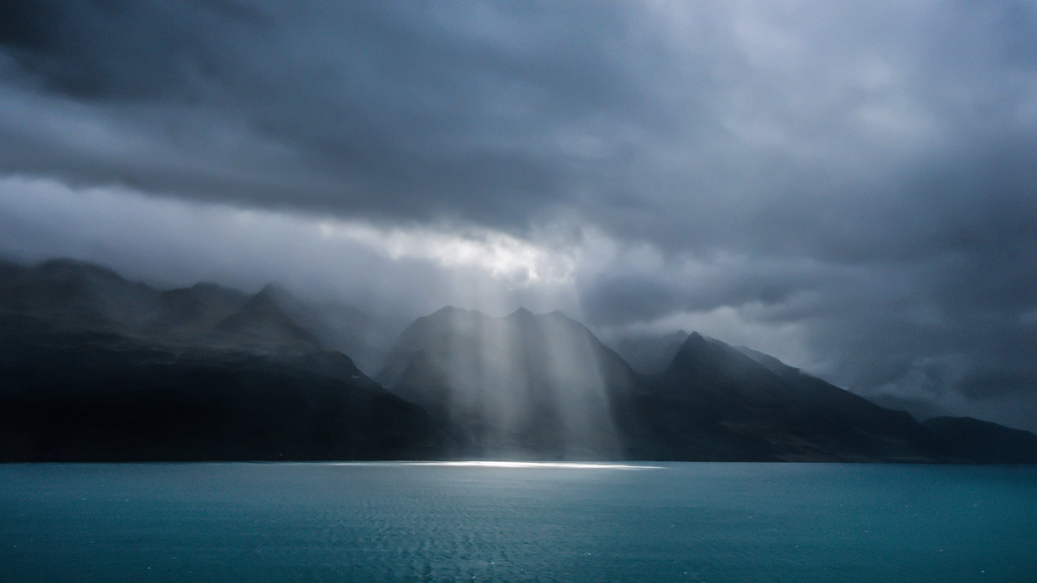 lake wakatipu queenstown new zealand spotlight storm