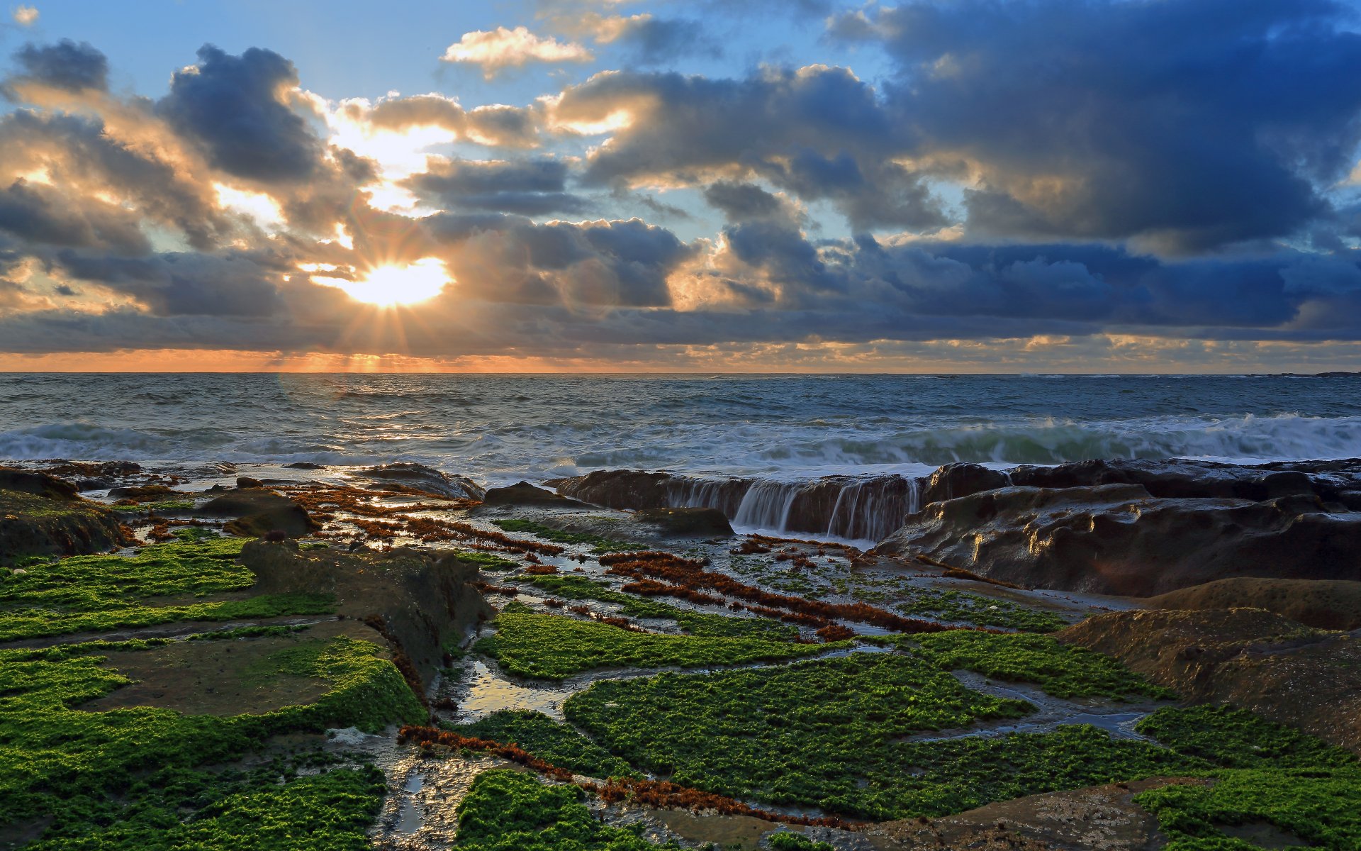 pacific ocean sunset stones clouds coast