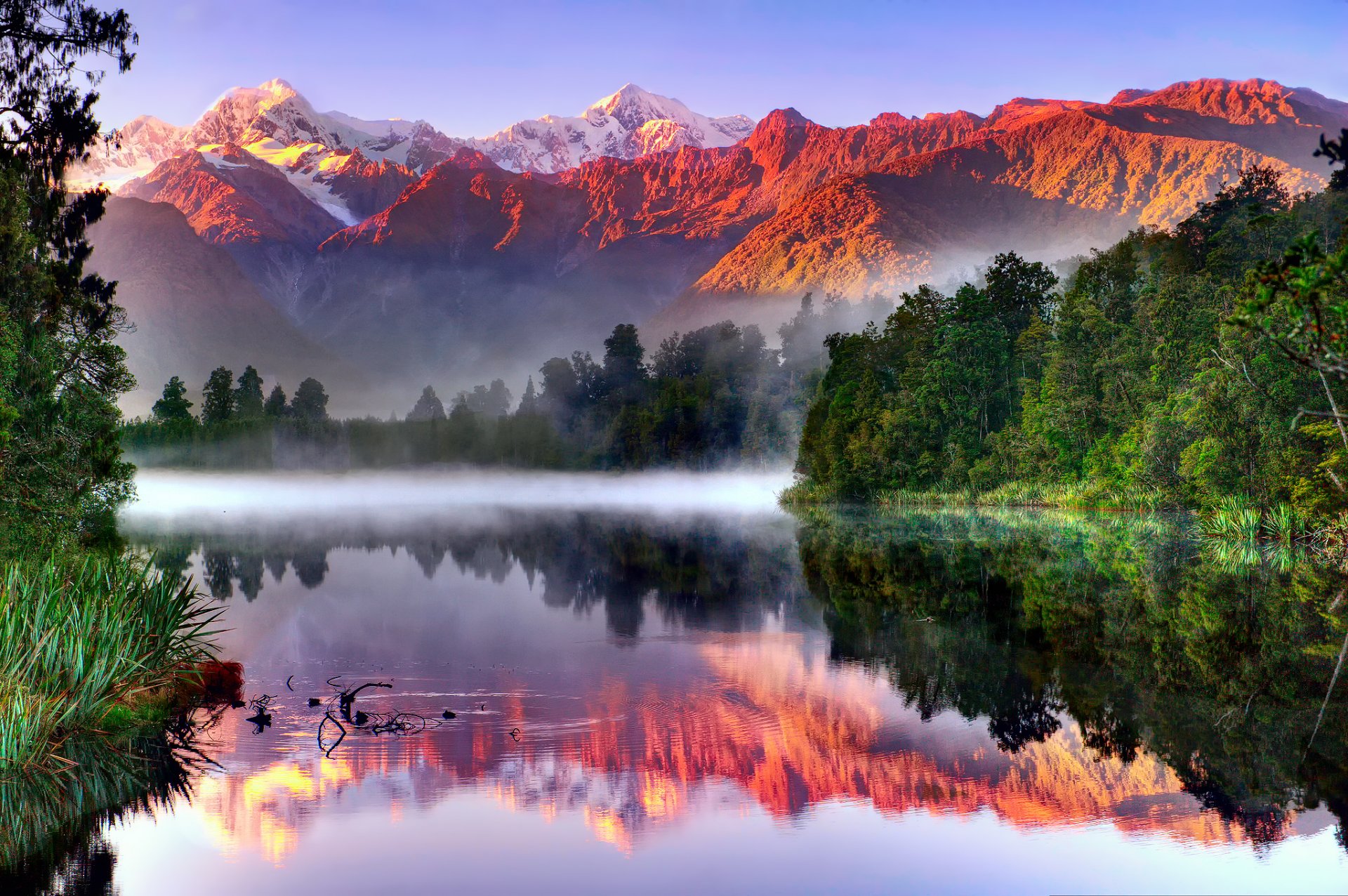 new zealand south island national park westland fox glacier mount cook southern alps lake matheson lake forest mountain sky reflection