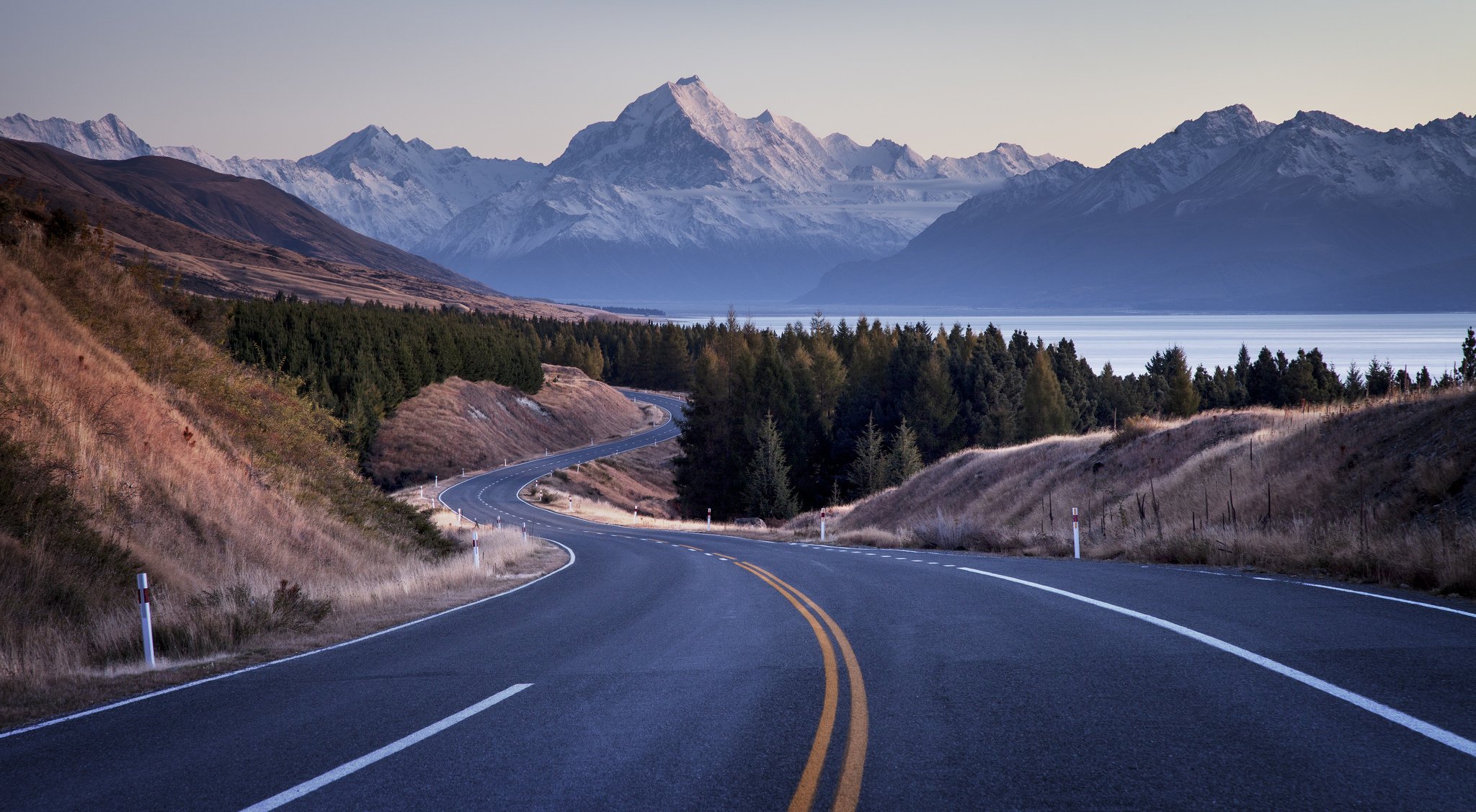 road winds bends turns mountain hills forest river the distance review sky view