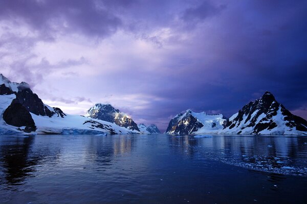 The shining glaciers of Antarctica at sunset