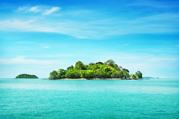 An island in the middle of the blue sea