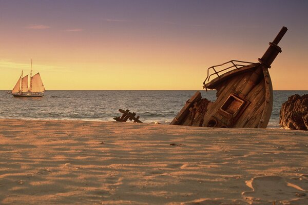 An abandoned ship on a sandy beach