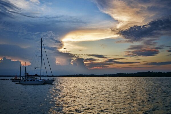 Boats on the background of evening clouds