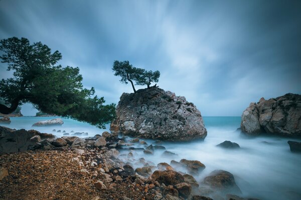 Stones on the seashore. Rocks on the beach