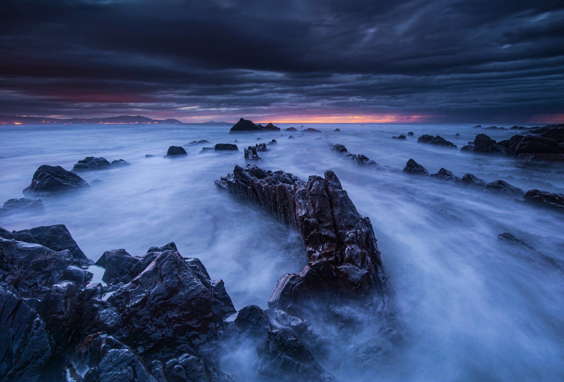 españa golfo de vizcaya costa rocas rocas tarde crepúsculo puesta de sol horizonte cielo nubes paisaje