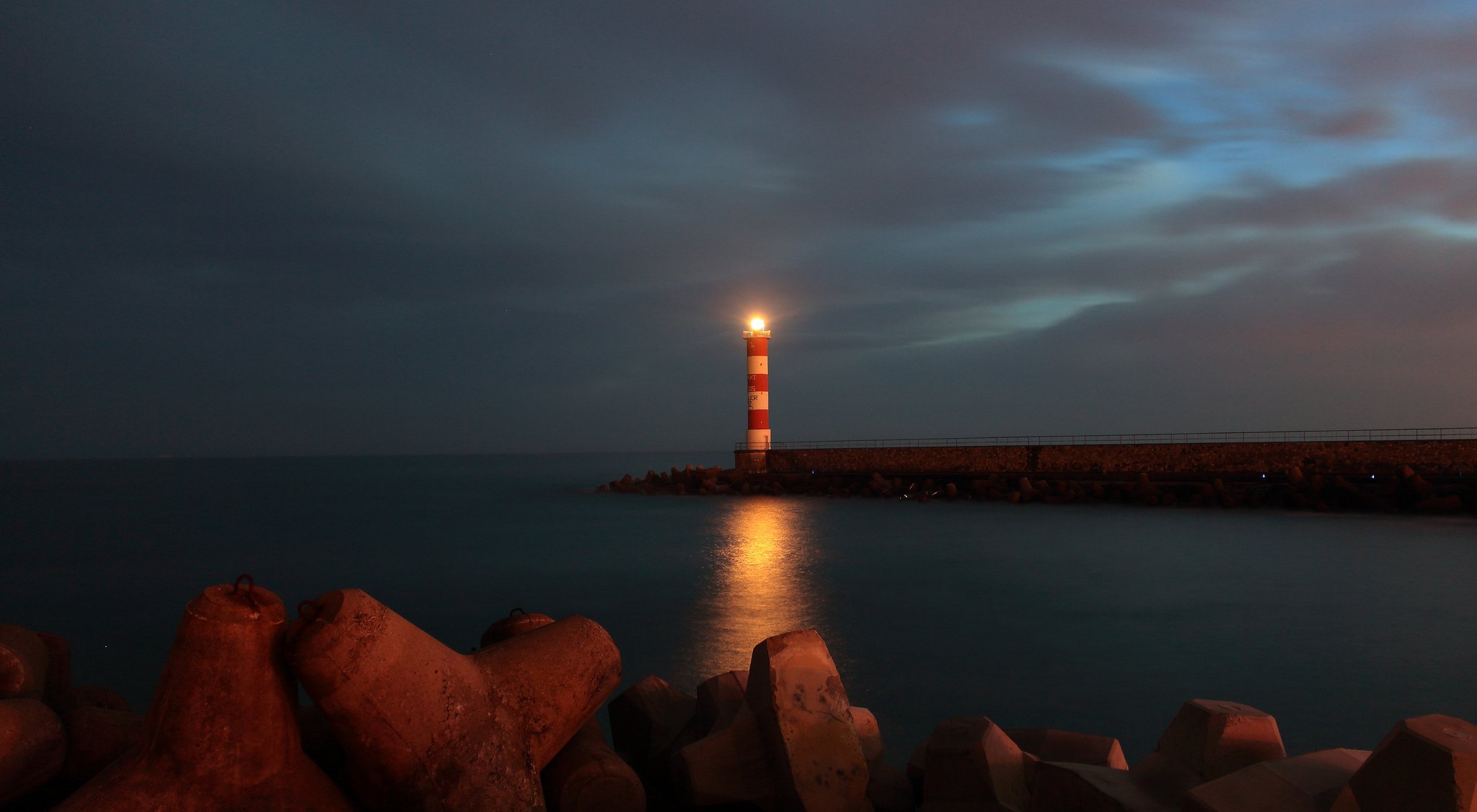 ea beach pier lighthouse twilight