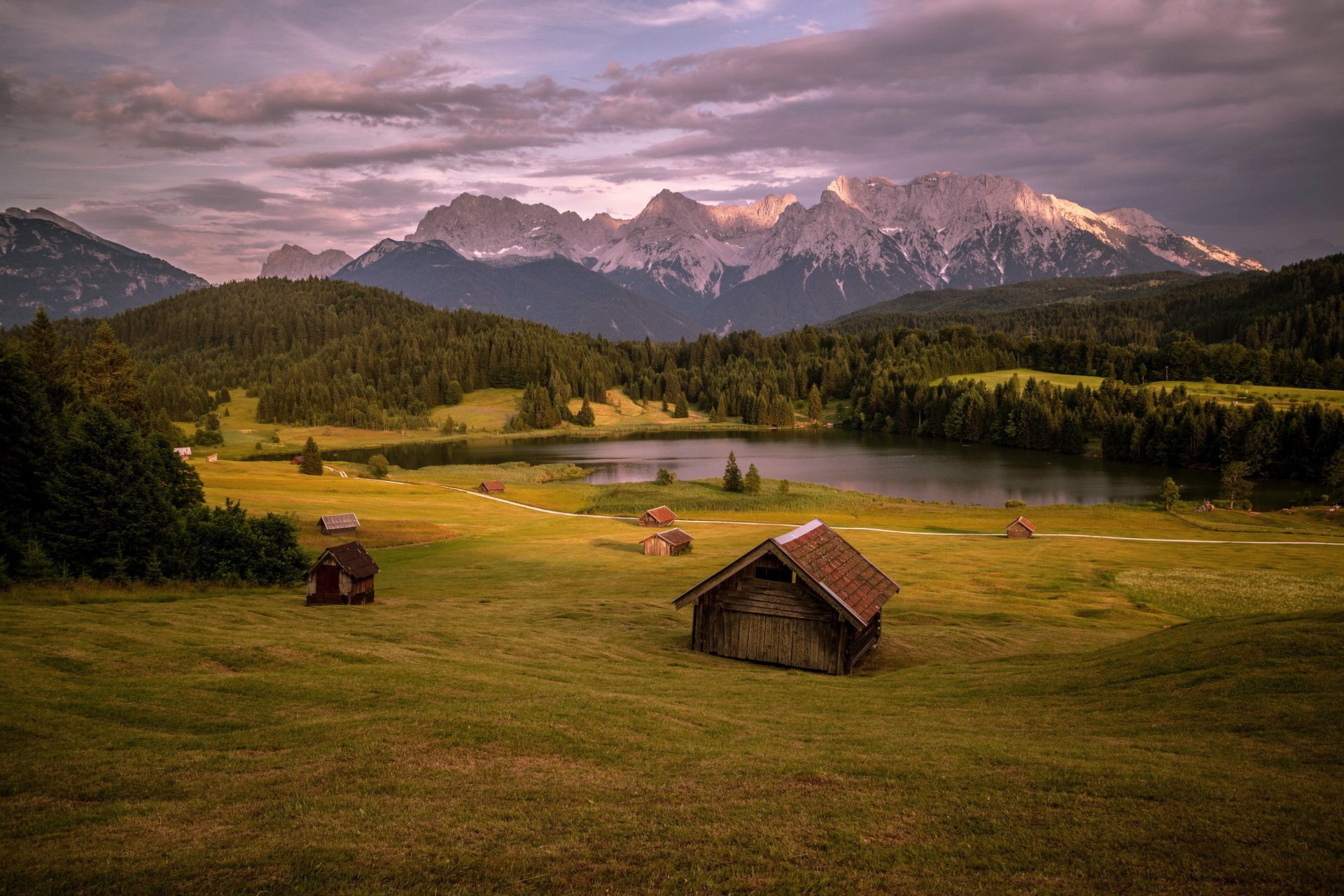 the field mountain lake houses landscape