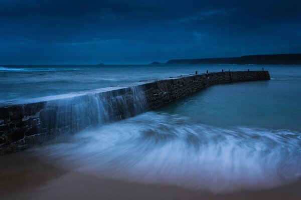 Pier at dusk on the coast of England