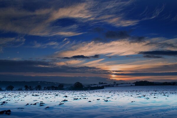 Sunset in the boundless winter steppe