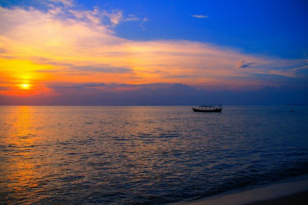 Olinokaya boat on the beach of the sea