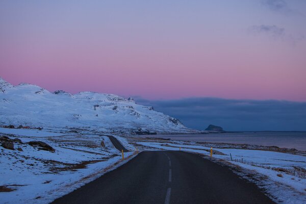 A road in Iceland against a beautiful sky