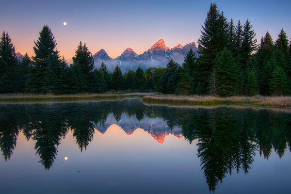 Reflection of the morning dawn in the river. USA