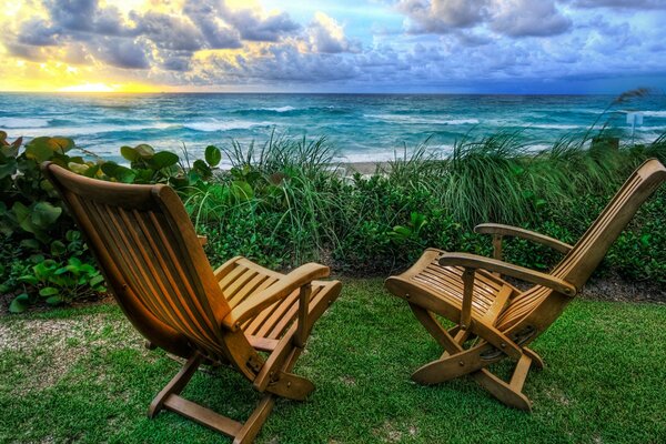 A delightful sunset. Chaise longue by the sea