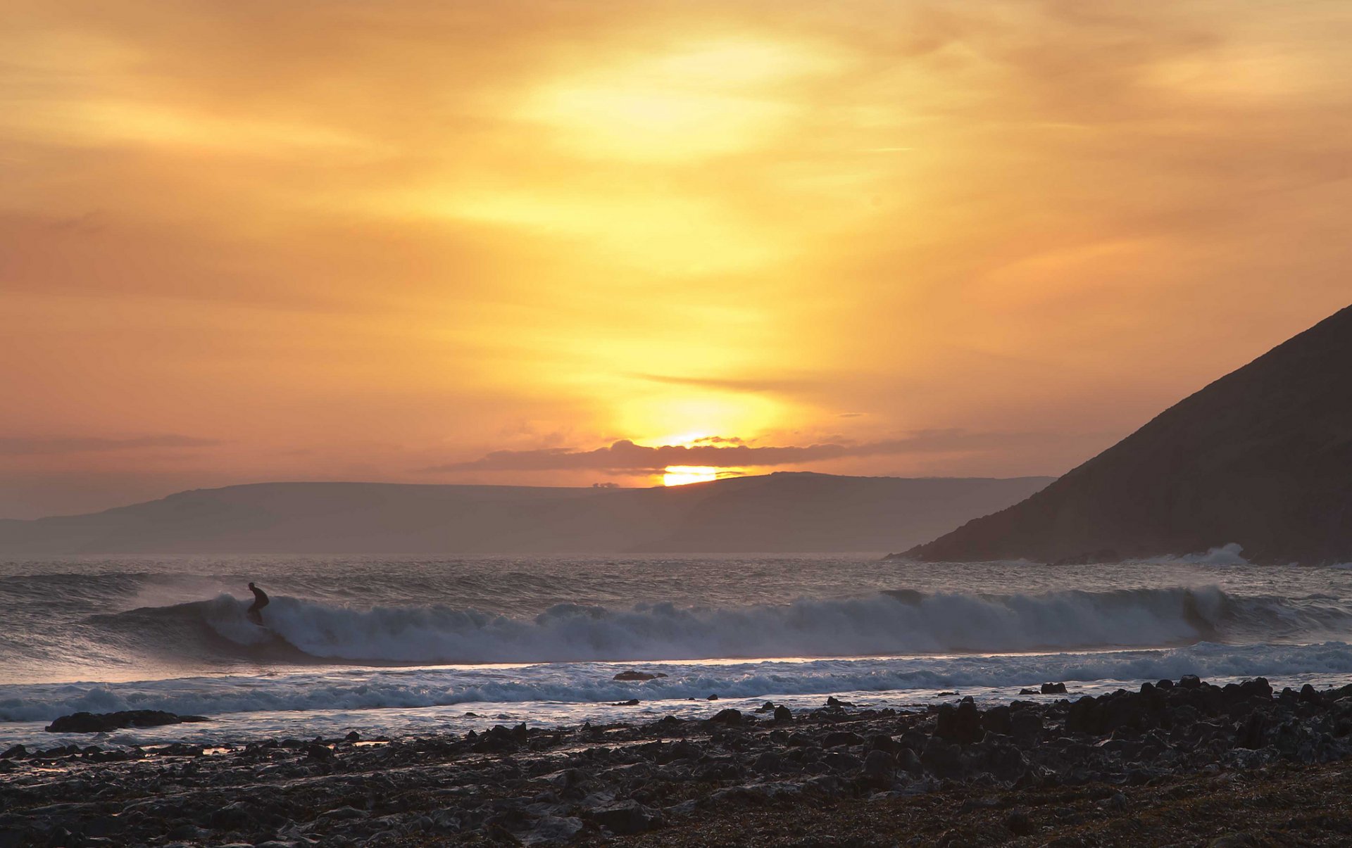 playa mar olas puesta de sol surf