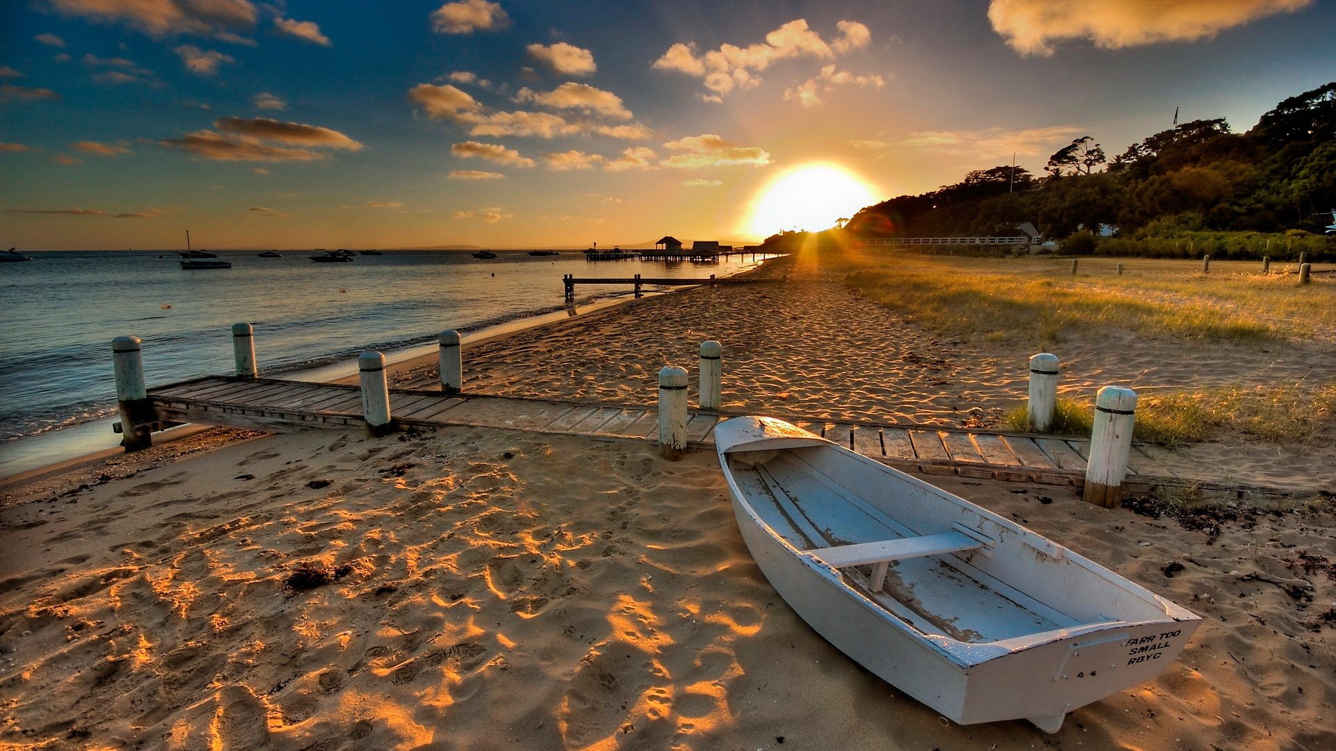 spiaggia sabbia barca sole tramonto acqua